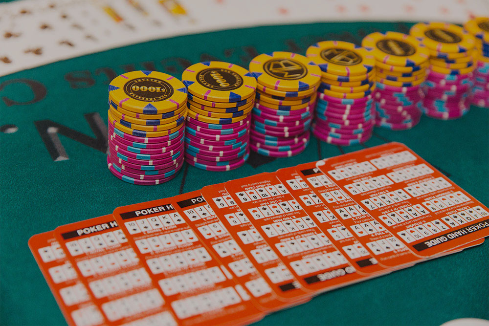 Poker table hire at a London event with players seated